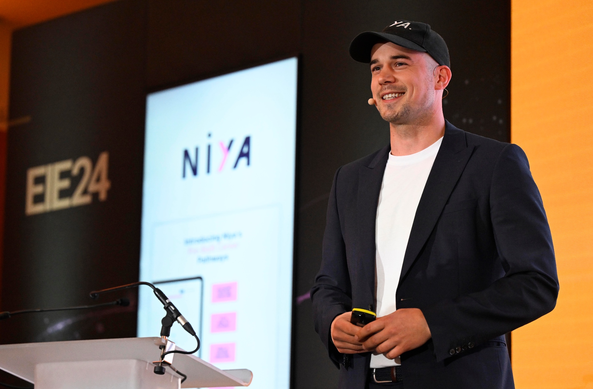 Hugh Chichester delivering a keynote on stage